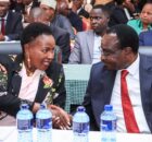 Education Cabinet Secretary Julius Migos Ogamba (Right) engages Machakos Governor Wavinya Ndeti during the County's Dialogue forum on implementation of the new Education Curriculum.