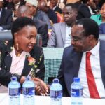 Education Cabinet Secretary Julius Migos Ogamba (Right) engages Machakos Governor Wavinya Ndeti during the County's Dialogue forum on implementation of the new Education Curriculum.